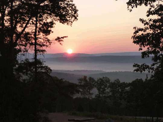 Slide0022.jpg - Sun rising over the beautiful Blue Ridge Mountains at the Purusha home, just 90 miles west of Washington, DC. From here Purusha will silently administer each of the 192 countries of the world.