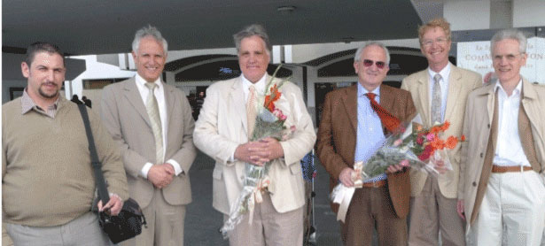 Tunesia003.jpg - Dr Bevan Morris, the Primer Minister of the Global Country of World Peace, arrived in Tunis, Tunisia with Dr Mariano Francipieri (also holding flowers). Greeting him at the airport were Atmane Kouider and his son Amine, to the left.