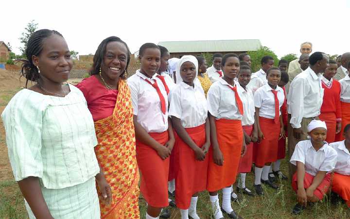 Uganda-GGn-(12).jpg - Although the talk continued through lunchtime, everyone wanted to gather outside for group photos with the teachers and guests.