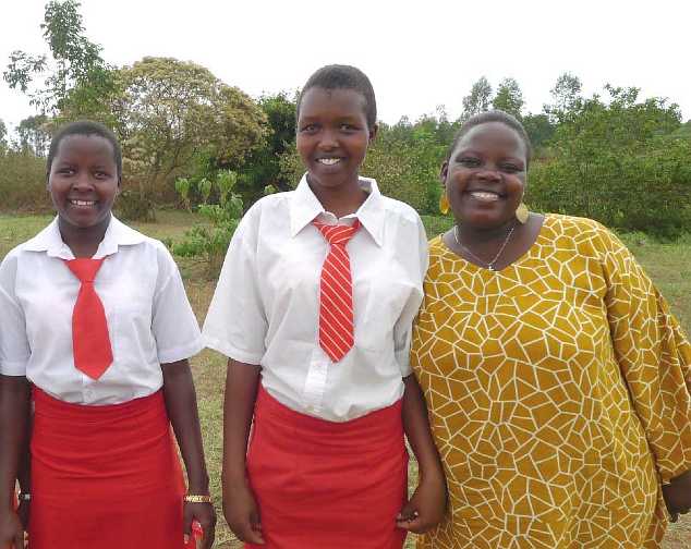 Uganda-GGn-(15).jpg - Two of the girls are pictured with one of the school administrators.
