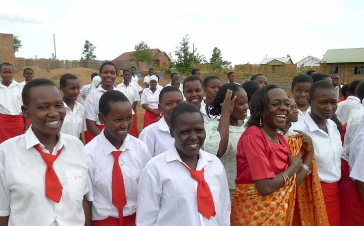 Uganda-GGn-(17).jpg - Students of the Maharishi Girls? Secondary School in Uganda express the joy of life with their teachers.