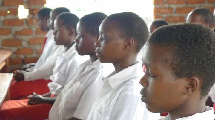 Uganda-GGn-(8).jpg - After a warm welcome of song and dance, everyone practised Transcendental Meditation together